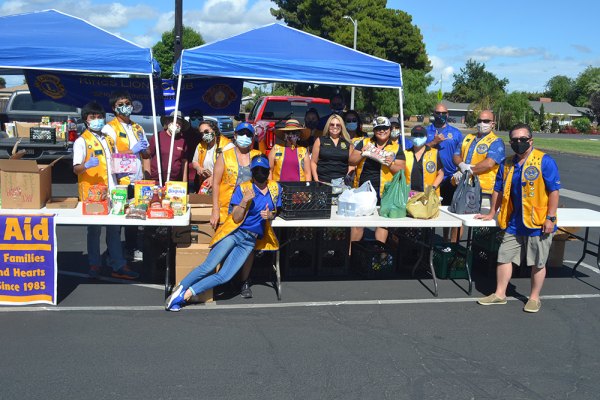 Assemblyman and friends distribute food in Hanford; Kings Lions host food drive Lemoore's Kings Lions Club hosted a community food drive Saturday morning to benefit Lemoore Christian Aid. Both groups were on hand as local drivers dropped off food.